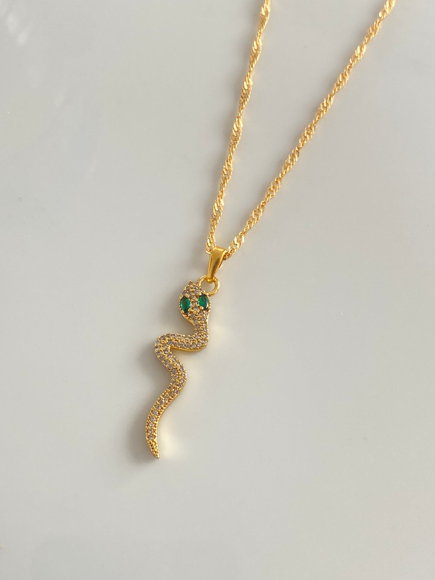 Green eyed snake necklace