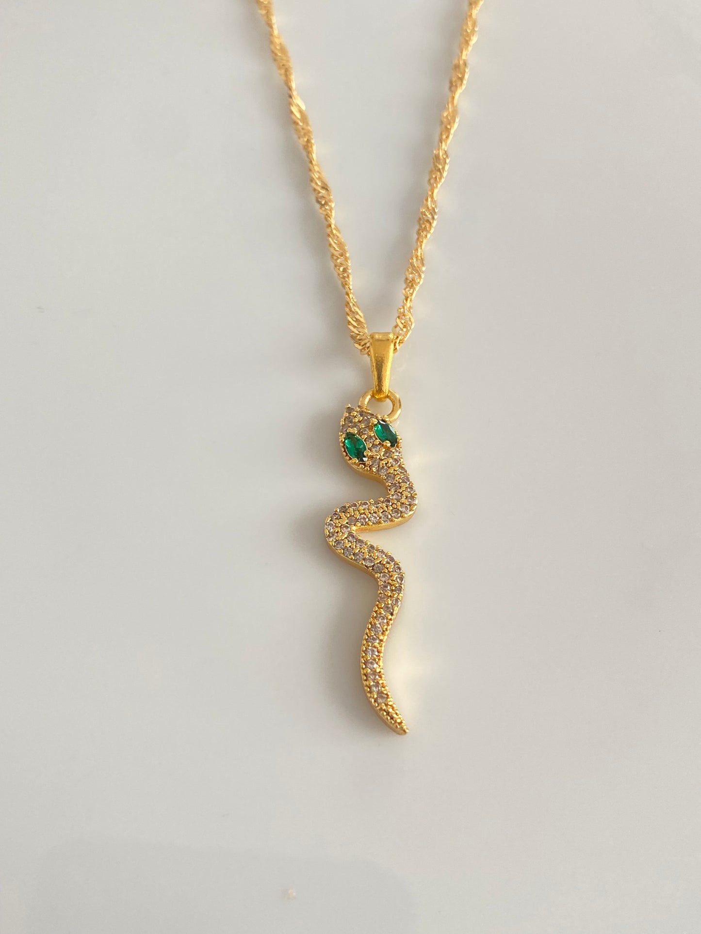 Green eyed snake necklace