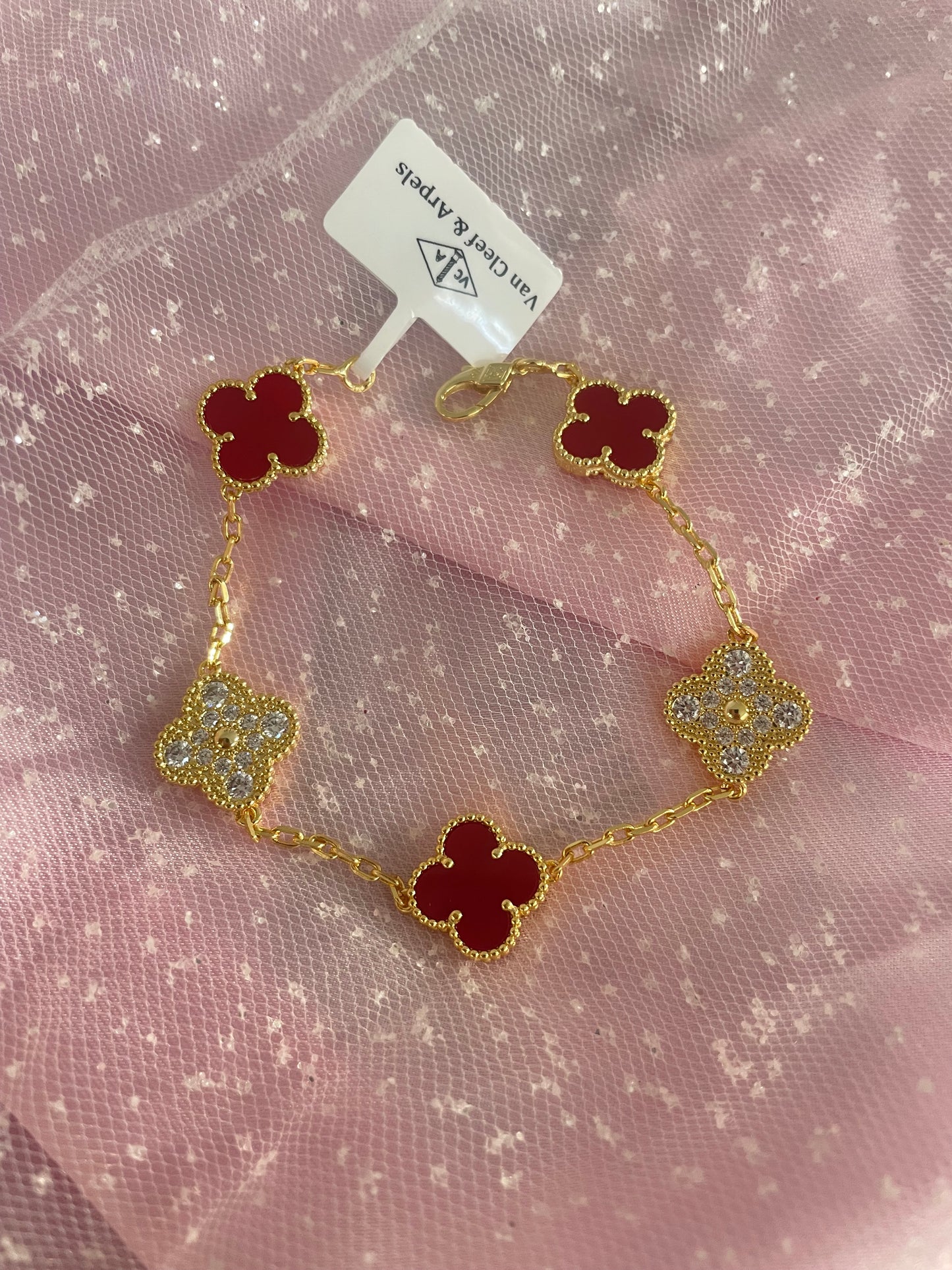 Red & diamond van cleef bracelet