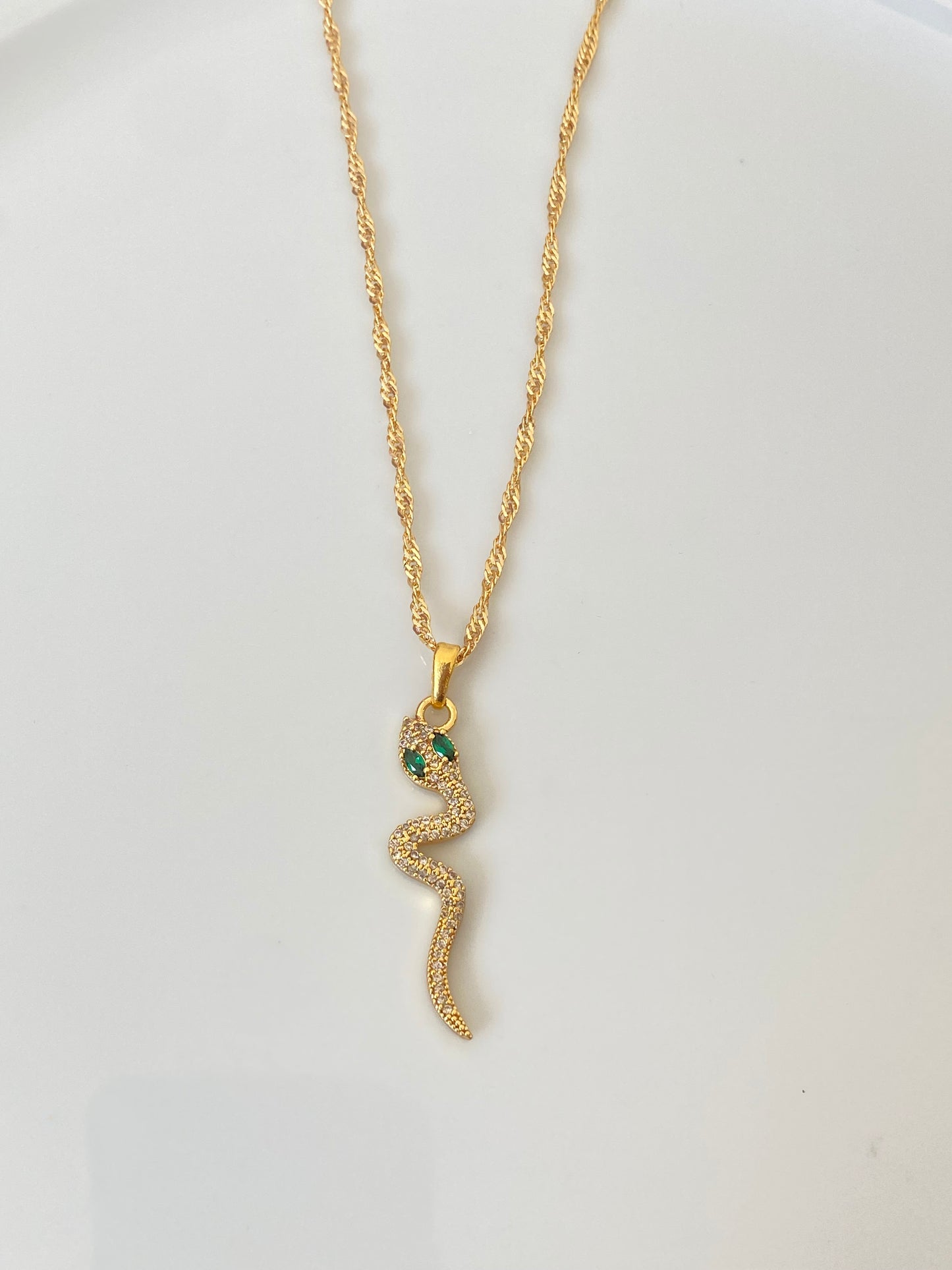 Green eyed snake necklace